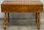 Lovely solid maple dropleaf table circa 1960s. Table I Features a lovely honey colored finish, turned splay legs, drop...