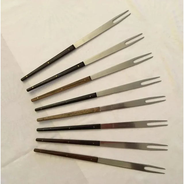 - Four stainless steel & rosewood fondue forks - Designed by Carl Auböck in 1959 - Original condition I have official...