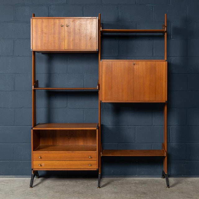 Introducing a wonderful piece of Italian design history, this is an exquisite mid-century modern bookcase from the 1960s....