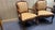 A graceful duo of carved wood accent chairs with classic French Provincial lines. Each chair features a gently curving...