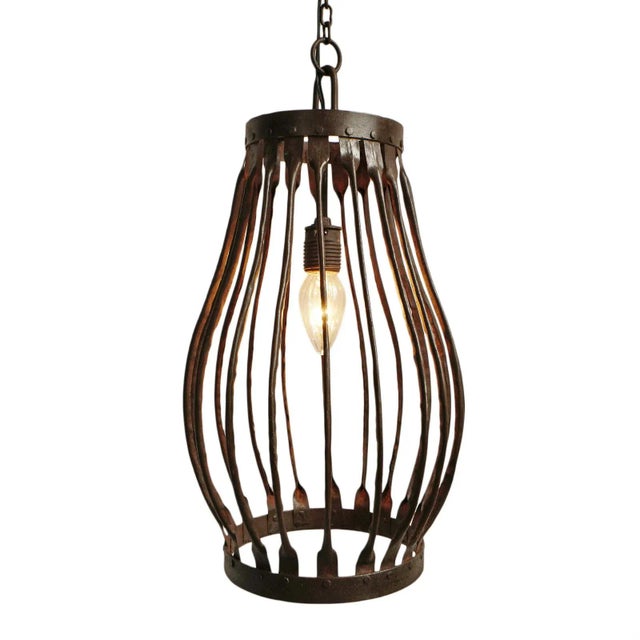 Vintage industrial iron farm pendant light. Includes 24" iron hanging chain. Each lantern may have slight variations in...