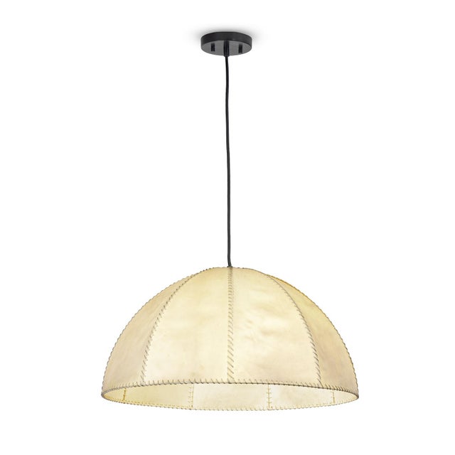 The Stevie Vellum Pendant brings natural texture and a soft, diffused glow to any room. Its silhouette moves effortlessly...