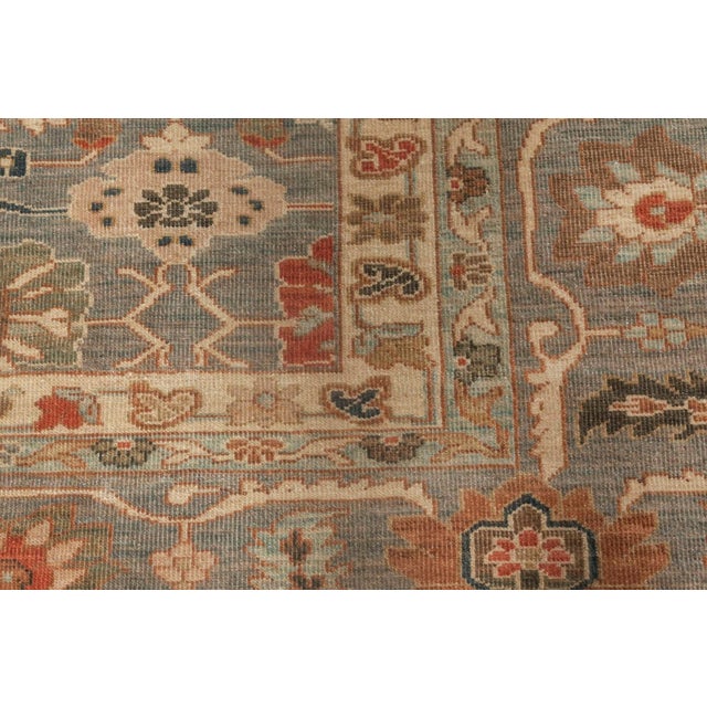 This hand-knotted wool rug is a modern interpretation of the classic Sultanabad tradition, celebrated for its large-scale...