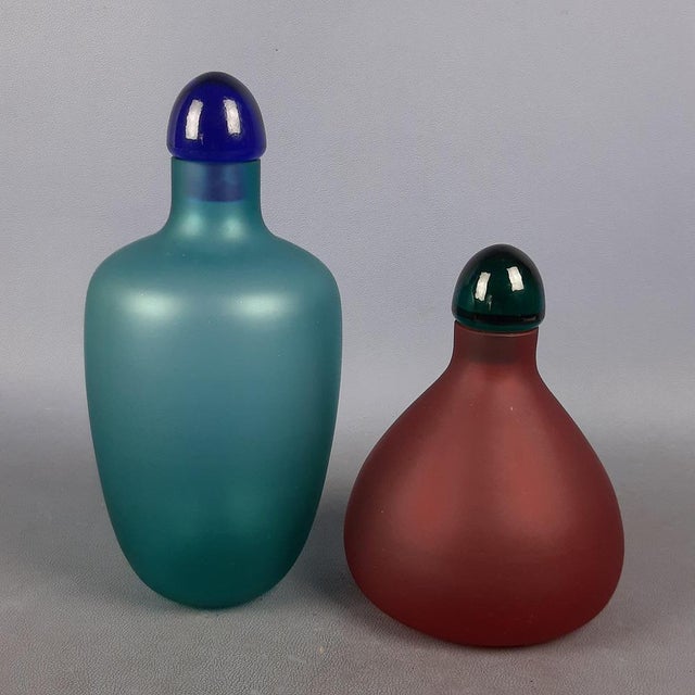 Elegant pair of decorative Murano glass bottles design V. Nason & C. They have a refined satin finish in aqua/blue and...