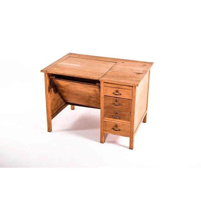 Rare desk from the Portuguese factory Olaio. Made in 1950 with oak wood. This desk have 3 drawers, one of them is a file....