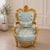 Bring timeless French elegance to your interior with this luxurious Louis XV-style armchair, featuring an ornate gold leaf...