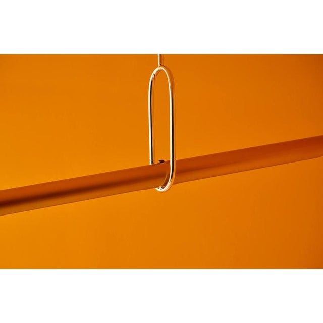 Calame pendant lamp by jennifer midoz dimensions: d 84,5 × w 8,5 × h 50 cm materials: sandblasted brass with white nickel...