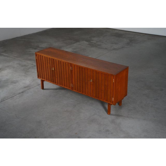 Unique one off sideboard. The sideboard is in a good condition with some signs of usage normal to it´s age. W 166 x D 39 x...