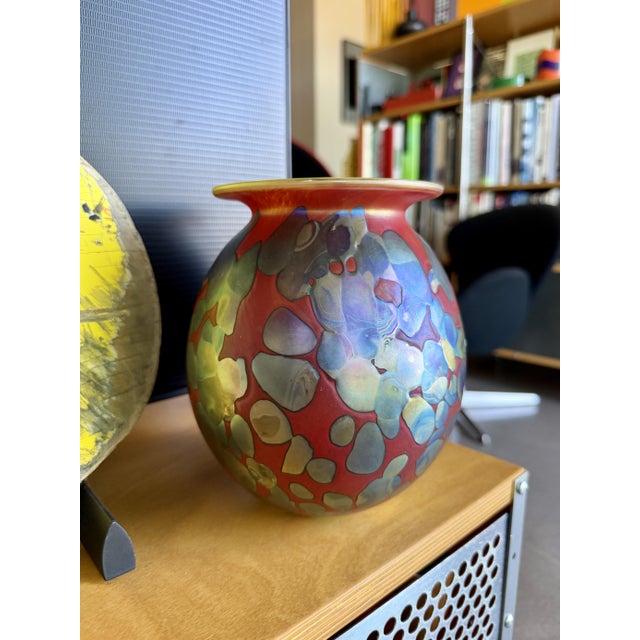 This hand-blown studio art glass vessel was designed and created by American artisan Robert Eickholt in 2006. The interior...