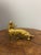 A vintage English brass fox, full of charm and character, with a lovely surface showing gentle wear and a rich, mellow...