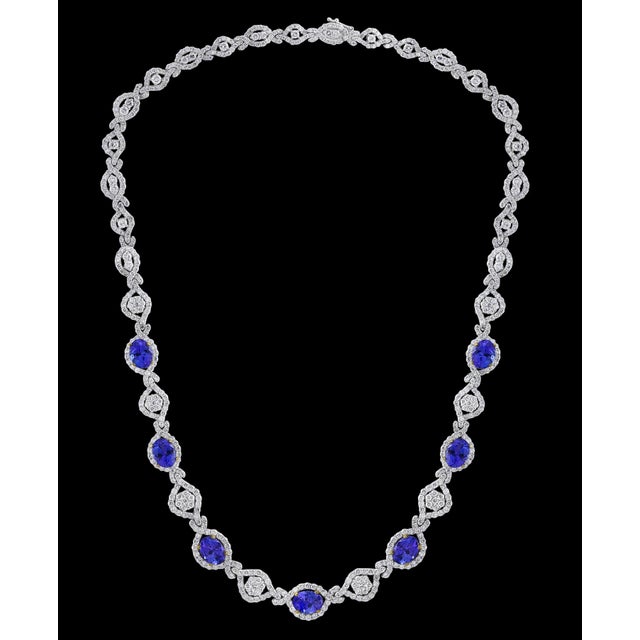 11 Carat Oval Tanzanite and 12 Carat Diamonds Necklace 18 Karat Gold Estate For Sale - Image 17 of 18