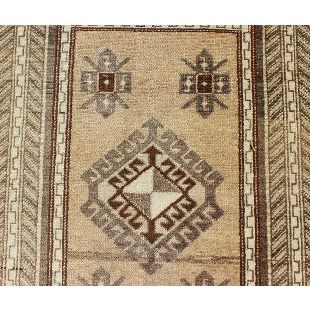 Earth-Toned Vintage Turkish Oushak Runner With Stacked Medallion Design For Sale - Image 10 of 12
