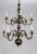 A spacious, Dutch Baroque style, 10-arm, brass chandelier with lovely decorative scroll work and acanthus leaf accents...