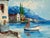 An original vintage oil on canvas by Giovanni Camprio, this signed and framed painting depicts a sailboat at the water’s...