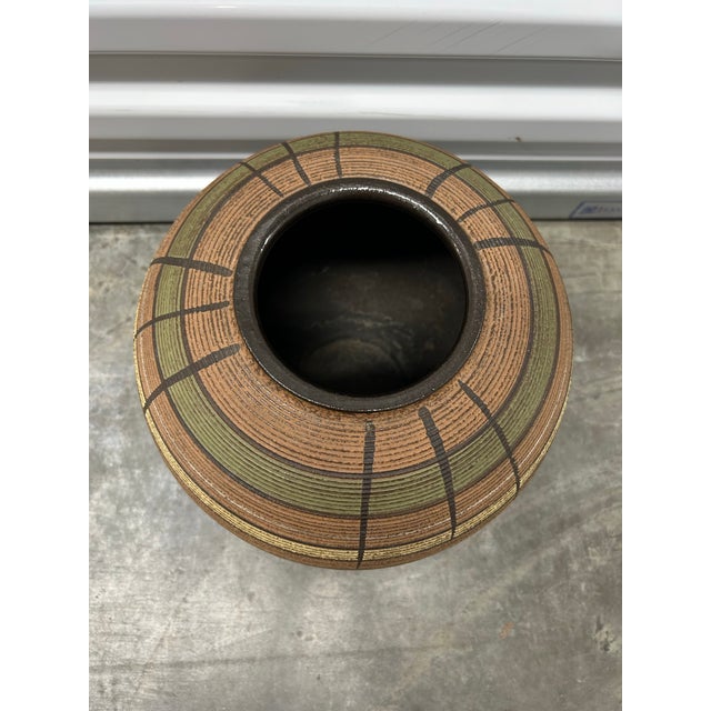 Large vintage vase in muted earthy tones from German pottery company founded in 1883 in Hohr Grenzhausen. The company...