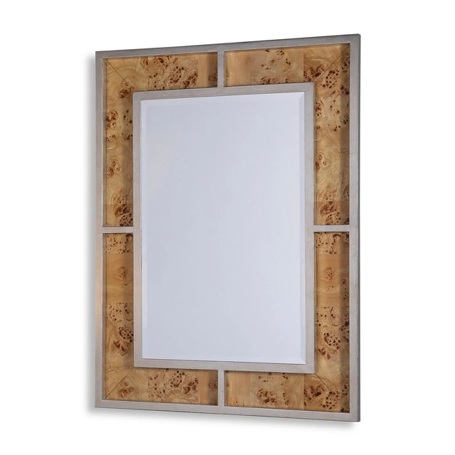 Made from silver leaf finished metal frames, the Bedford mirror is shown in monarch burl wood. Overall Measurements: 42"H...