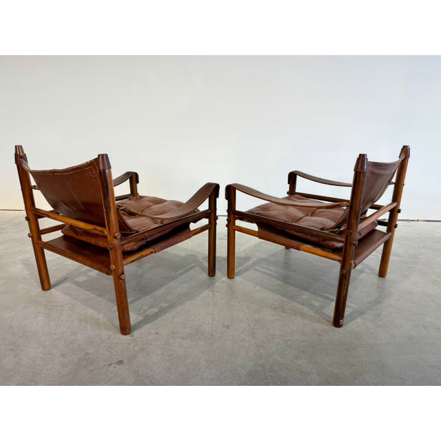 Wood Mid Century Arne Norell Sirocco Rosewood and Brown Leather Safari Chair Pair For Sale - Image 7 of 12