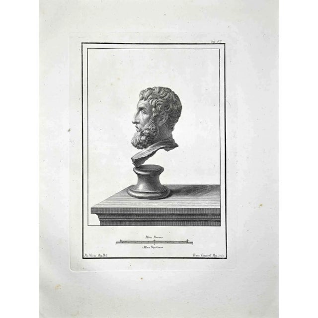 Profile of ancient roman bust, form the series "antiquities of herculaneum", is an original etching on paper realized by...