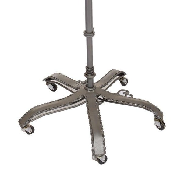 Vintage Adjustable Metal Clothing Display Rack 20thC Measures - 63 3/4" x 32" x 30 1/4" A vintage metal clothing display...