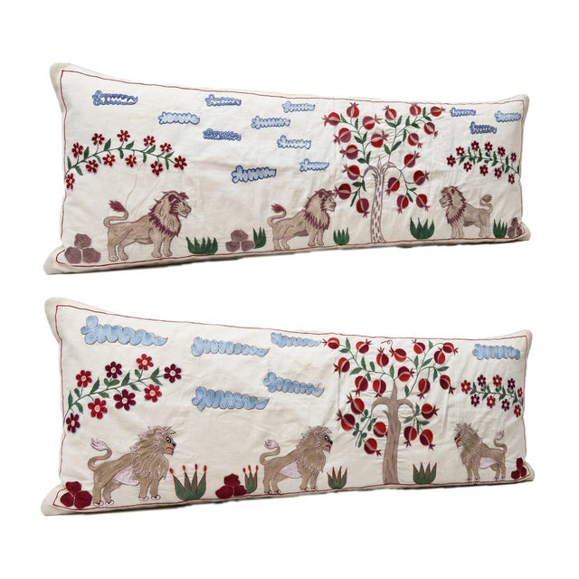 This beautiful 18'' x 54'' hand-embroidered Suzani pillow cover set was made from authentic Uzbek cotton fabric. The...