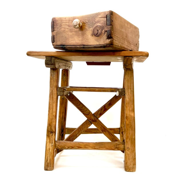 Circa 19th century Small Rustic Pine table. Handmade charming side table from Spain. Unusual construction technique and...