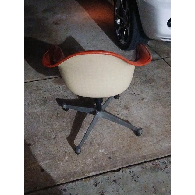Designer: Charles and Ray Eames for Herman Miller Model: Molded Fiberglass Armchair on Swivel Contract Base (PAC/PSC...