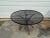 Mid-Century Outdoor Iron Salterini Round 48" Dining Table Offered is a Mid-Century Outdoor Iron Woodard Round Dining...