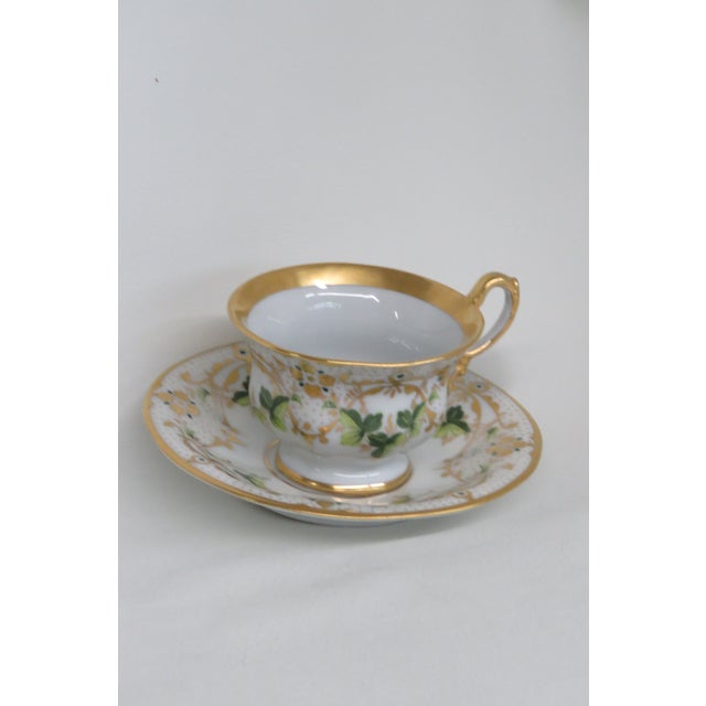 This lovely tea cup and saucer set is made of bone china. This set is stamped as being made by Carl Tielsch C. T. Germany,...