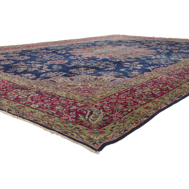 78336 Vintage Persian Kerman Rug, 11'04 x 15'10. Displaying an impressive array of floral elements with incredible detail...