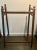 For collector's of curious antiques. Early 20th C. wooden walker, my best guess. But might also have been used for clothes...
