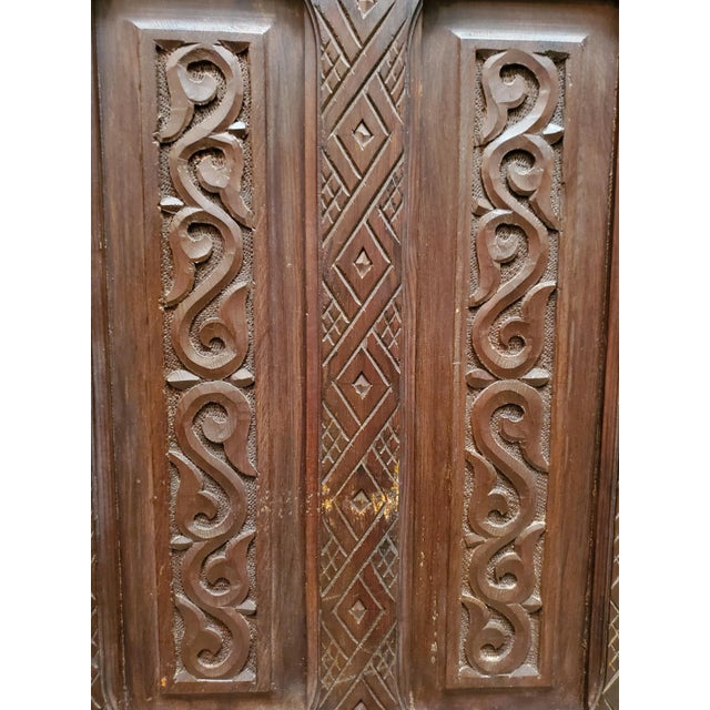 This is a beautiful old Moroccan double-panel wooden door from early 80s, measuring just approximately 81" in height and...