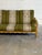 Danish three-seat sofa in style of Henning Kjærnulf, featuring solid oak construction with sculptural carved details and...