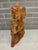 A beautifully stylized, highly decorative late 20th-century Balinese modernist wood carving capturing the divine bridal...