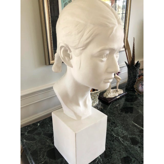 1960s Vintage life-size plaster of Paris bust of female figure supported by plaster base. The face is beautifully sculpted...