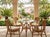 Organic modern rattan table for 4 chairs designed after McGuire. Elegant curves and leather laced joints assure quality...