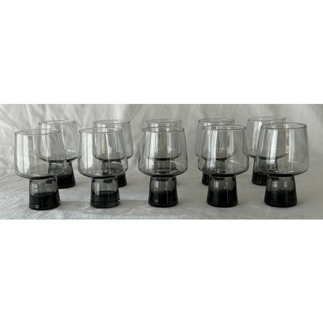 Chic 1970's smoky grey stackable Libbey glasses! The unique shape of this glassware makes them incredibly versatile. They...