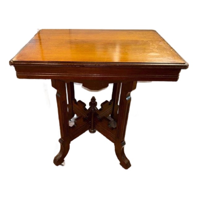 Early 20th Century Walnut Victorian Eastlake Parlor Table With Carved Details For Sale