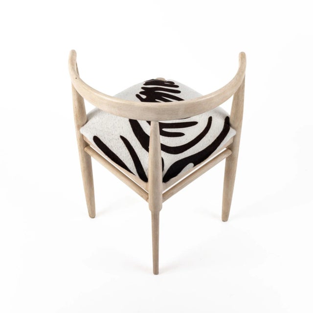 This chair expertly crafted from premium solid white oak. The sturdy frame is skillfully bleached to bring out the natural...