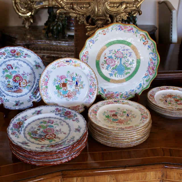 An assembled set of fine antique English porcelain including 10 Ashworth (10 ¼ inch) dinner plates, 15 (9 inch) Minton...
