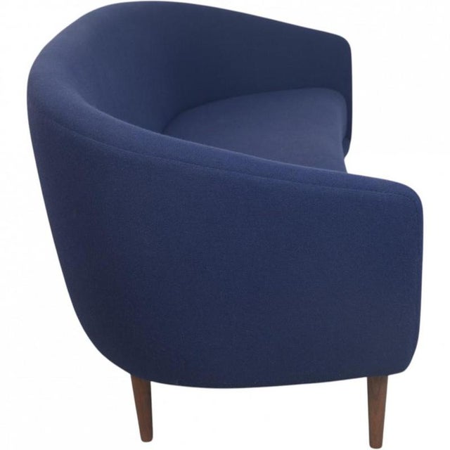 Finn Juhl Lillemor 3-seater sofa upholstered in blue Hallingdal fabric and with legs of walnut. The sofa is from the late...