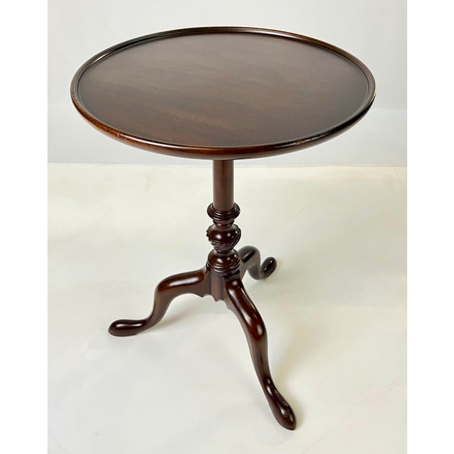Exquisite mahogany dish-top candle stand by Kittinger. This piece is a licensed reproduction from the "Historic Newport"...