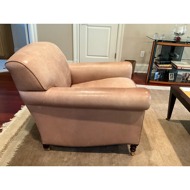 George Smith Leather Club Chair from +/- 2010. The feather seat was re-stuffed in September 2025. Nailed head detail on...