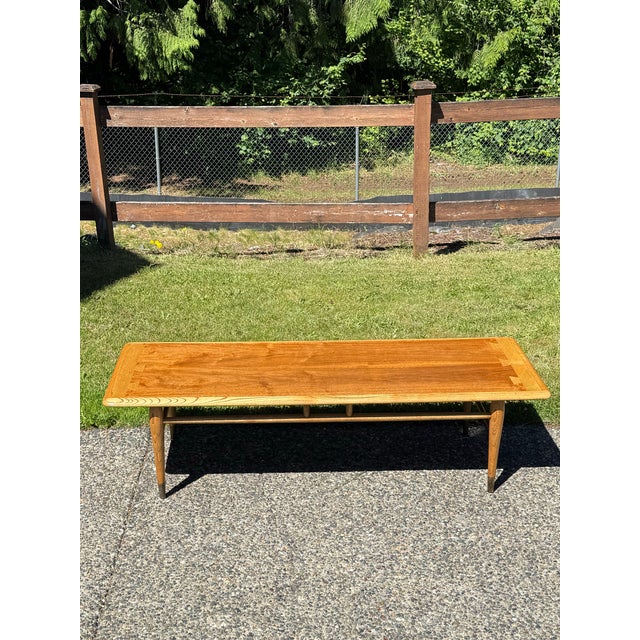 Mid century modern Lane Furniture "Acclaim" Walnut and Ash Coffee Table Lane Furniture's "Acclaim" line was designed by...