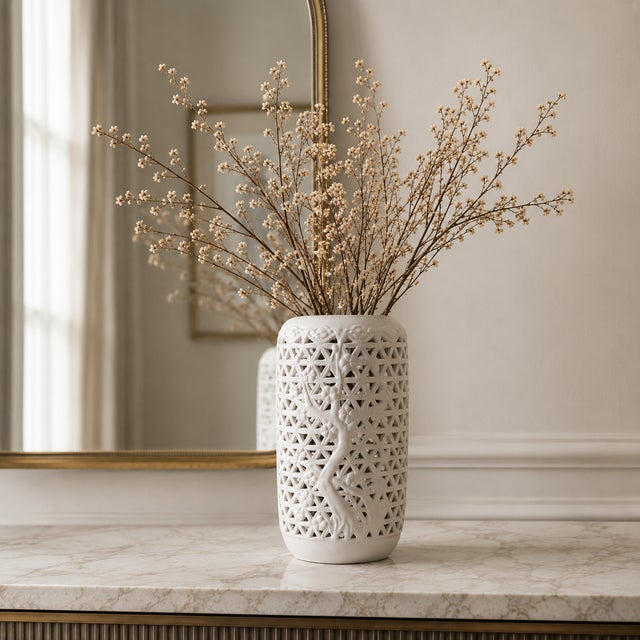 This mid-century Japanese Blanc de Chine reticulated Chinoiserie vase features a delicate lattice openwork design...