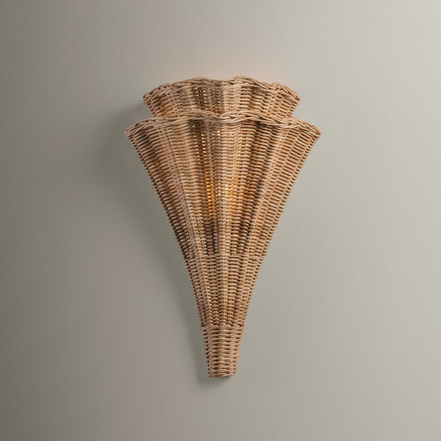 Airy and organic, the Arverne sconce lends breezy coastal style to any space. Two hand-woven wicker shades nest together...