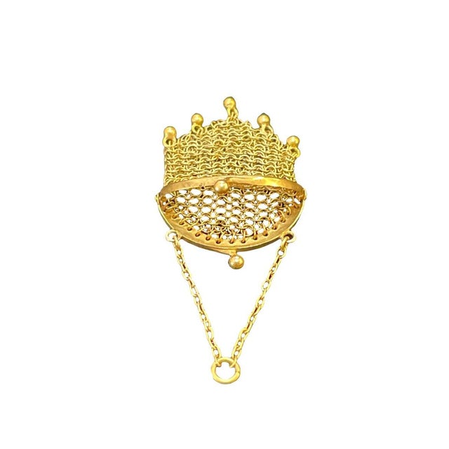 Charming vintage chain-mesh purse charm pendant crafted in solid 14k yellow gold. Beautifully detailed with moving mesh...