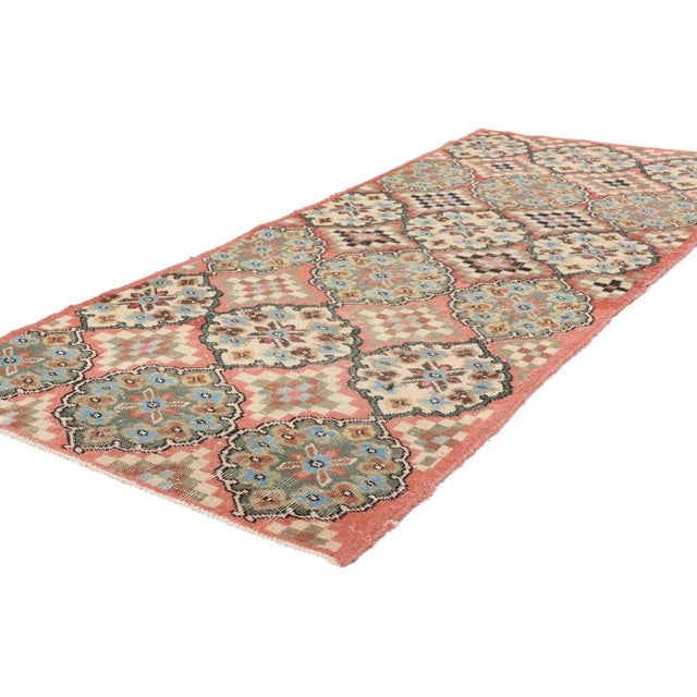 52013 Zeki Muren Vintage Turkish Sivas Rug, 03’00 x 07’02. Nestled amidst the serene landscapes of Turkey's Sivas region,...