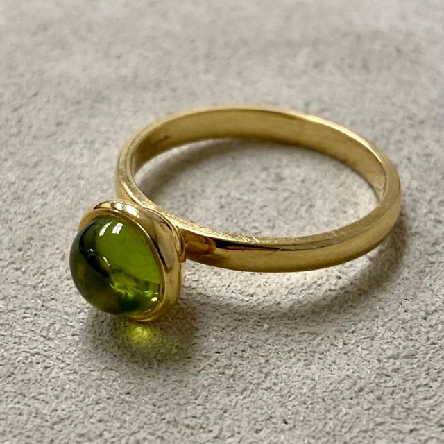 Created in 18 karat yellow gold Peridot 2 carats approx. Ring size US 6.5, can be sized upon request. Crafted from 18K...