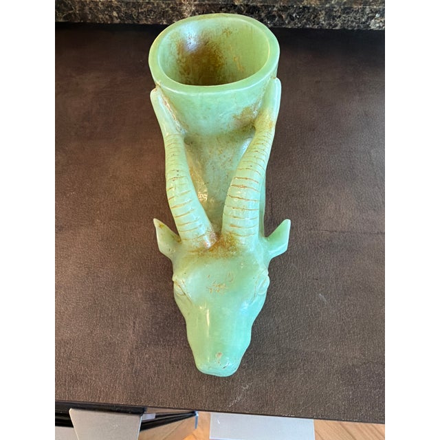 Quang dynasty hand carved jue cup in the form of a water buffalo. Very large and very heavy and most definetly jade.