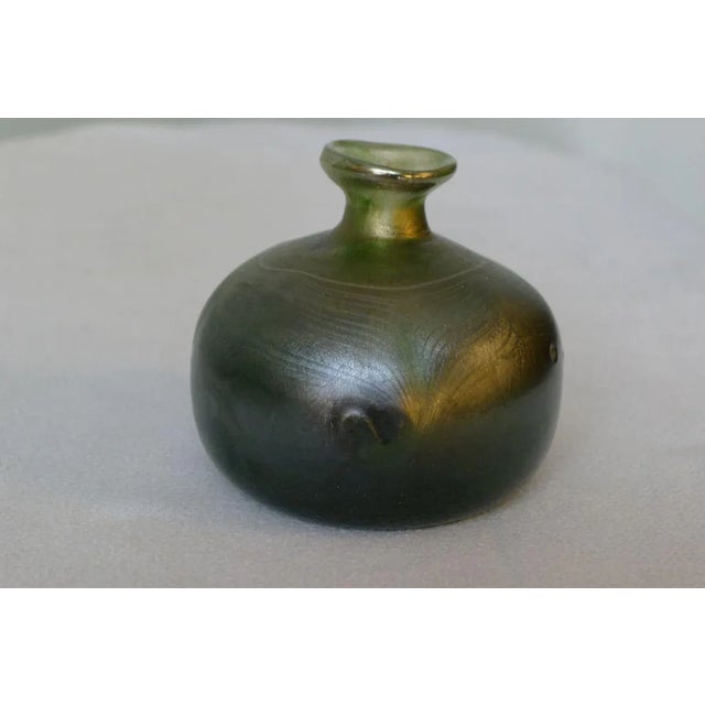 Studio glass vase by Erwin Eisch. Signed and dated 1980. Irritating shades of green with a fine gradient. Tear-off not...